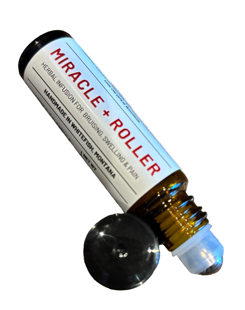 Miracle Roller bottle with black roller ball on a white background